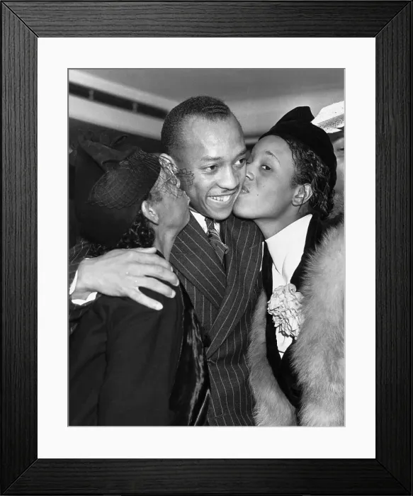 Framed Print : Jesse Owens Being Kissed by Wife and Mother Framed Print : Jesse Owens Being Kissed by Wife and Mother