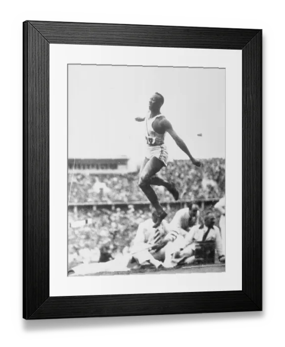 Framed Print : Jesse Owens in the Air During Olympic Games Framed Print : Jesse Owens in the Air During Olympic Games