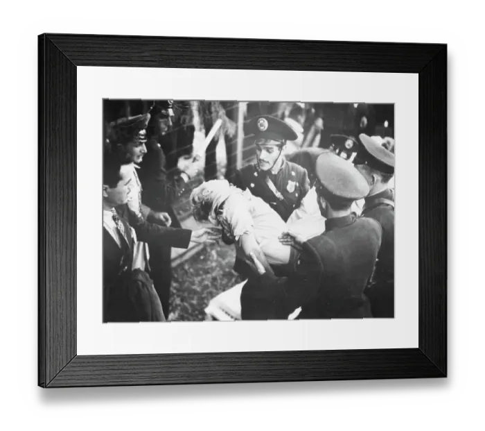 Framed Print : Miss Helie Nice Being Carried By Officer Framed Print : Miss Helie Nice Being Carried By Officer