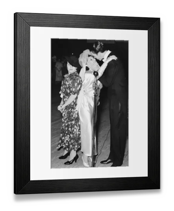 Framed Print : James Moore and Violet Hilton Kissing at Wedding Framed Print : James Moore and Violet Hilton Kissing at Wedding