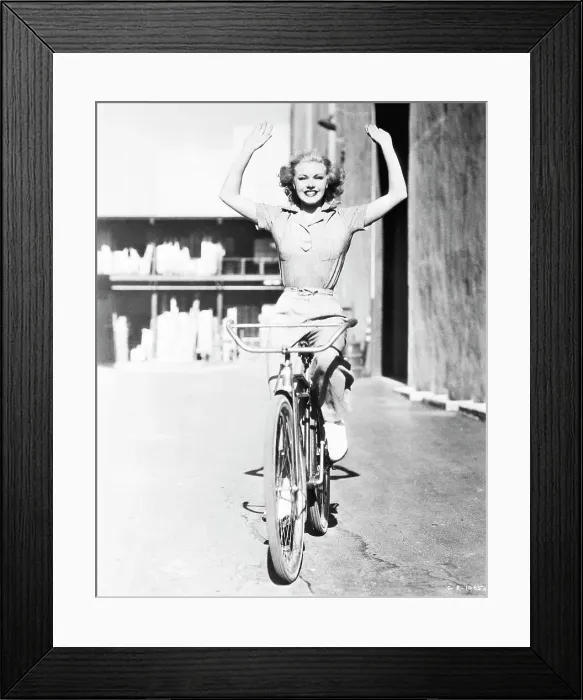 Framed Print : Ginger Rogers Riding a Bicycle Framed Print : Ginger Rogers Riding a Bicycle