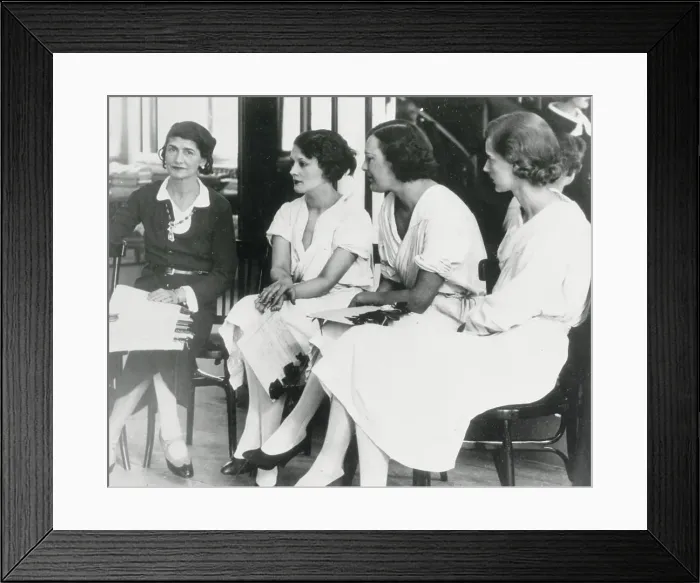 Framed Print : Mademoiselle Chanel Conversing with Her Employees Framed Print : Mademoiselle Chanel Conversing with Her Employees