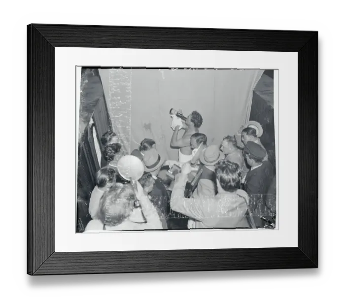 Framed Print : Max Schmeling Drinking a Bottle of Champagne Framed Print : Max Schmeling Drinking a Bottle of Champagne