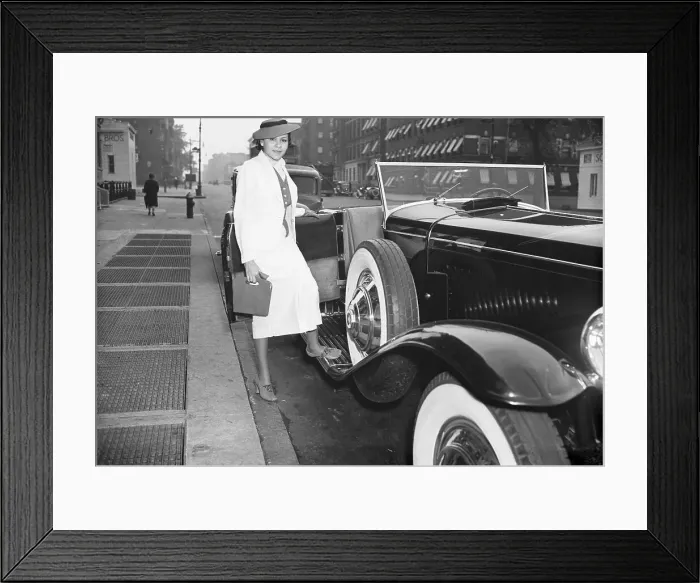 Framed Print : Marva Louis Stepping into Car