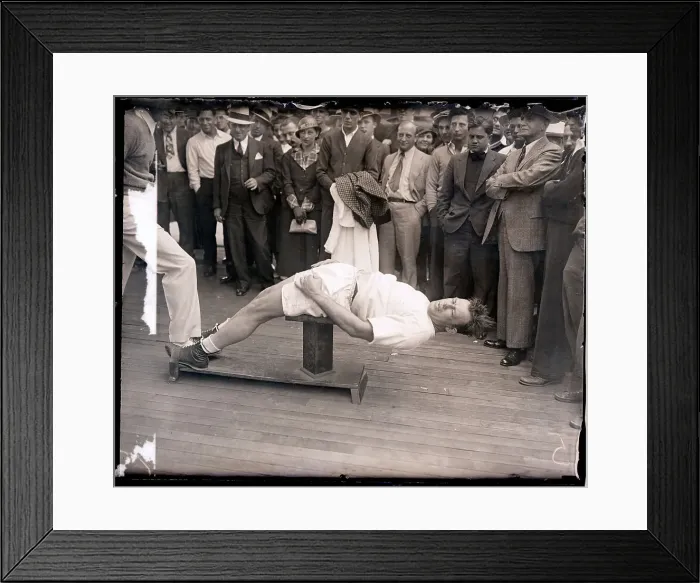 Framed Print : Jack Sharkey Doing Sit-Ups on Post Framed Print : Jack Sharkey Doing Sit-Ups on Post
