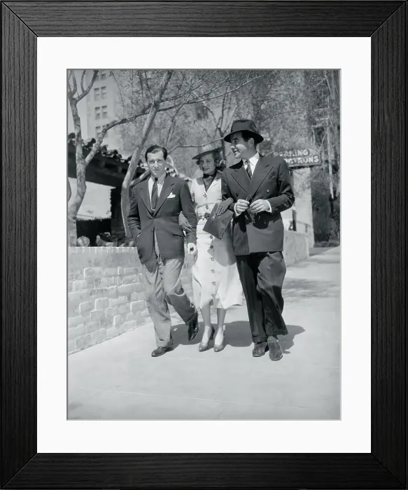 Framed Print : Performer Lucille Ball Walking Arm in Arm With Broderick Crawford and a Friend Framed Print : Performer Lucille Ball Walking Arm in Arm With Broderick Crawford and a Friend