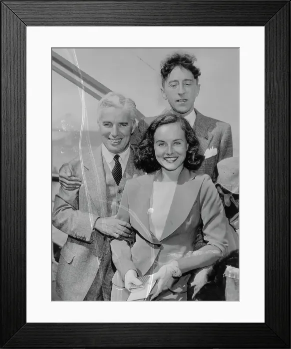 Framed Print : Charlie Chaplin Posing with Paulette Goddard and Jean Cocteau Framed Print : Charlie Chaplin Posing with Paulette Goddard and Jean Cocteau