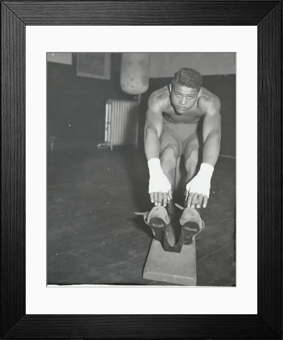 Framed Print : Joe Louis Stretching His Muscles Framed Print : Joe Louis Stretching His Muscles