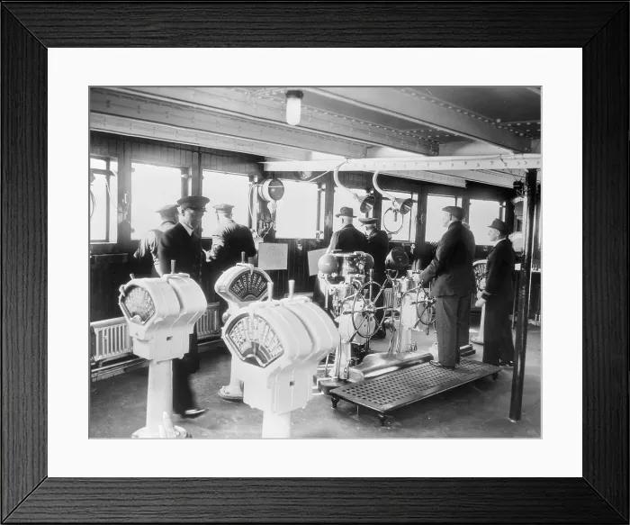 Framed Print : Ship Captain Standing at The Wheel Framed Print : Ship Captain Standing at The Wheel