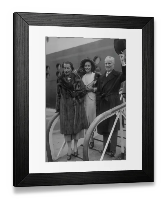 Framed Print : Charlie Chaplin Posing with Paulette and Mrs. Goddard Framed Print : Charlie Chaplin Posing with Paulette and Mrs. Goddard