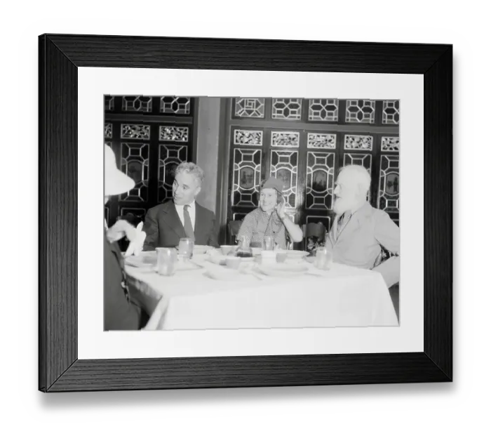 Framed Print : Charlie Chaplin and Others at Dinner Framed Print : Charlie Chaplin and Others at Dinner