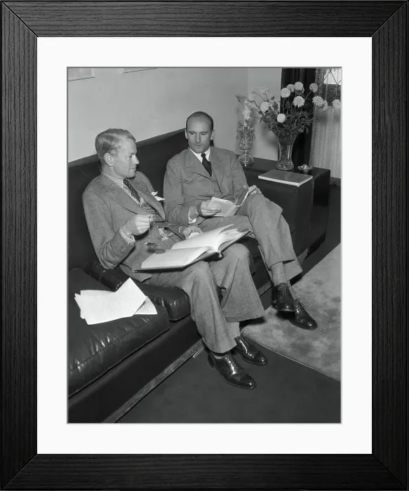 Framed Print : James Whale Discussing Film Script Framed Print : James Whale Discussing Film Script