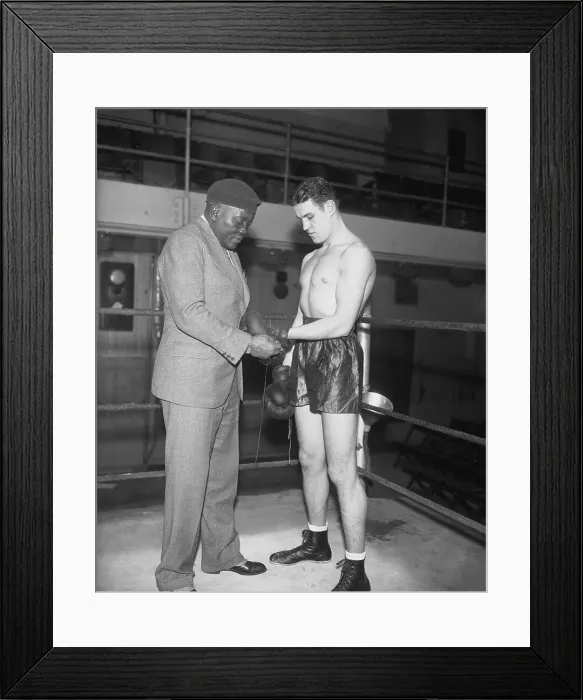 Framed Print : Jack Johnson Adjusting the Gloves of His Trainee Framed Print : Jack Johnson Adjusting the Gloves of His Trainee