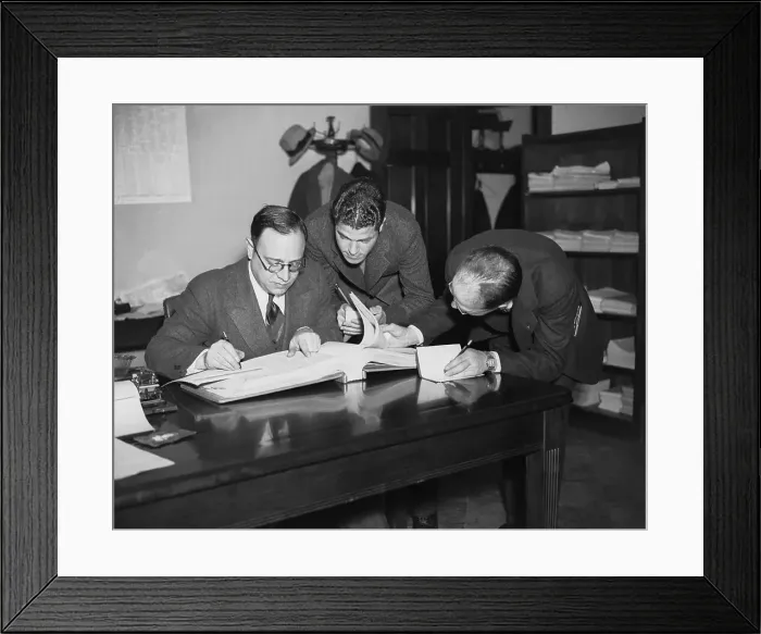 Framed Print : Men Thumbing Through a Sucker List Framed Print : Men Thumbing Through a Sucker List