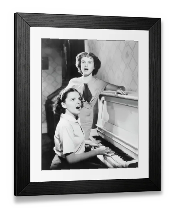 Framed Print : Judy Garland and Deanna Durbin Singing at Piano Framed Print : Judy Garland and Deanna Durbin Singing at Piano