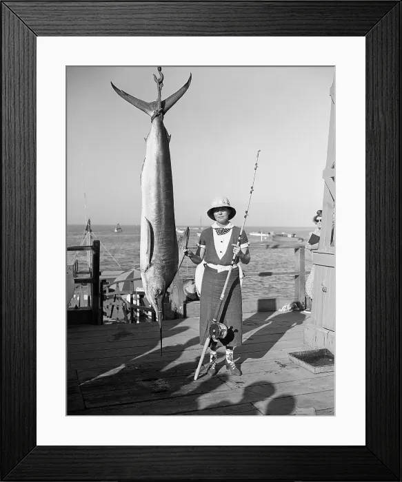 Framed Print : Woman Holding Swordfish She Caught Framed Print : Woman Holding Swordfish She Caught