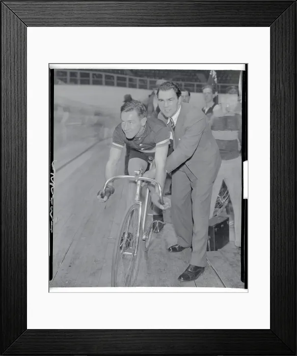 Framed Print : Max Schmeling Assisting Bike Rider Framed Print : Max Schmeling Assisting Bike Rider