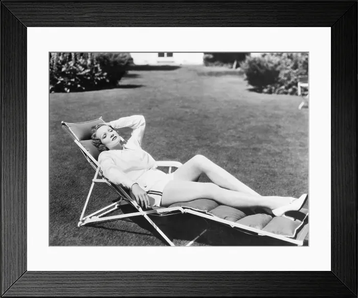 Framed Print : Marlene Dietrich Relaxing in a Lawn Chair Framed Print : Marlene Dietrich Relaxing in a Lawn Chair
