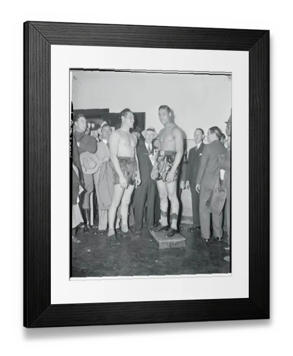 Framed Print : Joe Louis Standing on Scale Framed Print : Joe Louis Standing on Scale