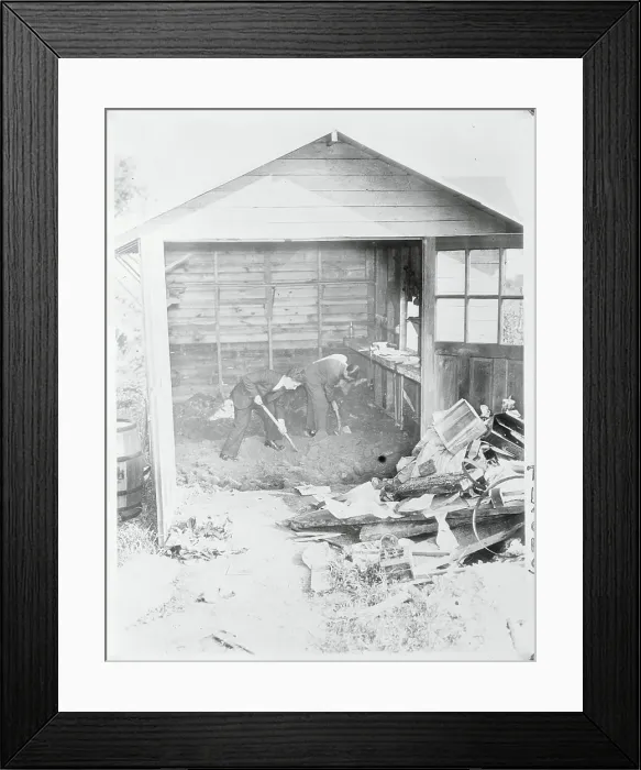 Framed Print : Policemen Digging in a Garage Framed Print : Policemen Digging in a Garage