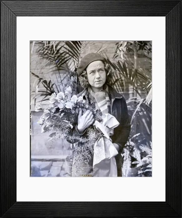 Framed Print : Laura Ingalls Standing Holding Flowers Framed Print : Laura Ingalls Standing Holding Flowers