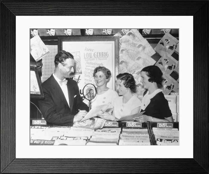 Framed Print : Lou Gehrig Autographing Copies of Record by Wife Framed Print : Lou Gehrig Autographing Copies of Record by Wife