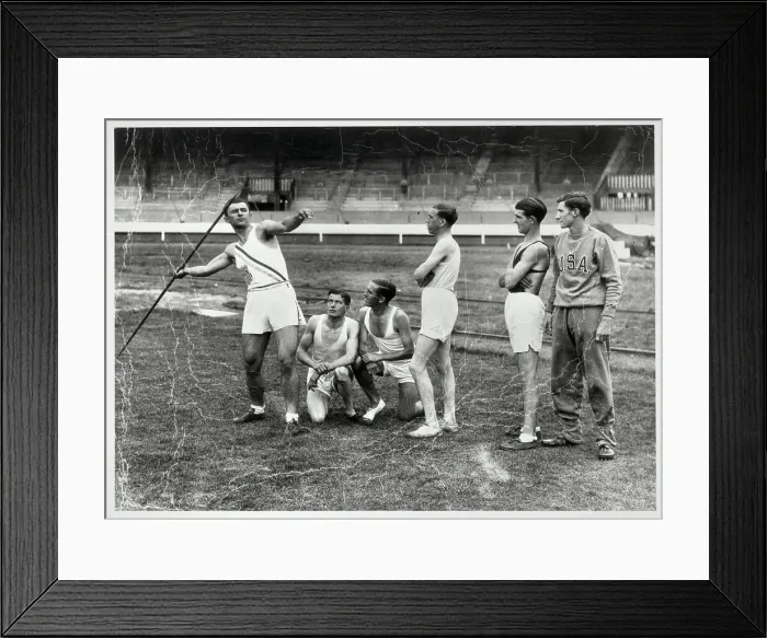 Framed Print : Competitors Watching Man Throw Javelin Framed Print : Competitors Watching Man Throw Javelin