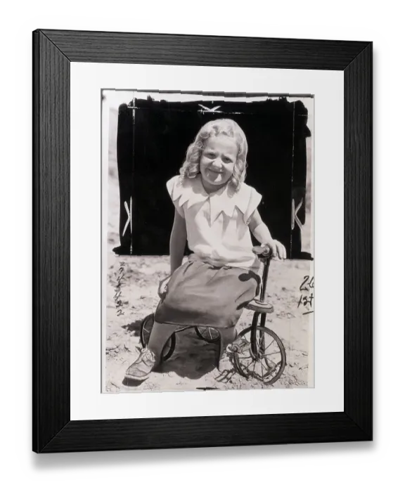 Framed Print : Girl Posing on Tricycle Framed Print : Girl Posing on Tricycle