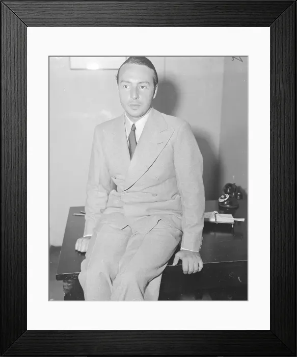 Framed Print : George Balanchine Sitting on a Table Framed Print : George Balanchine Sitting on a Table