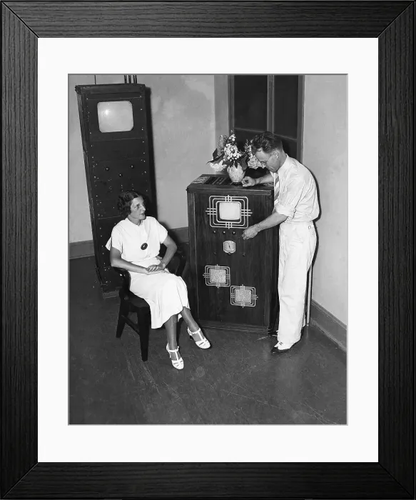 Framed Print : Woman Watches Inventor Demonstrate TV Framed Print : Woman Watches Inventor Demonstrate TV