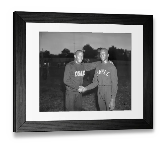 Framed Print : Jesse Owens Shaking Hands with Eulace Peacock