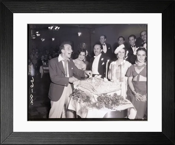 Framed Print : Jimmy Durante Cuts Cake at Party
