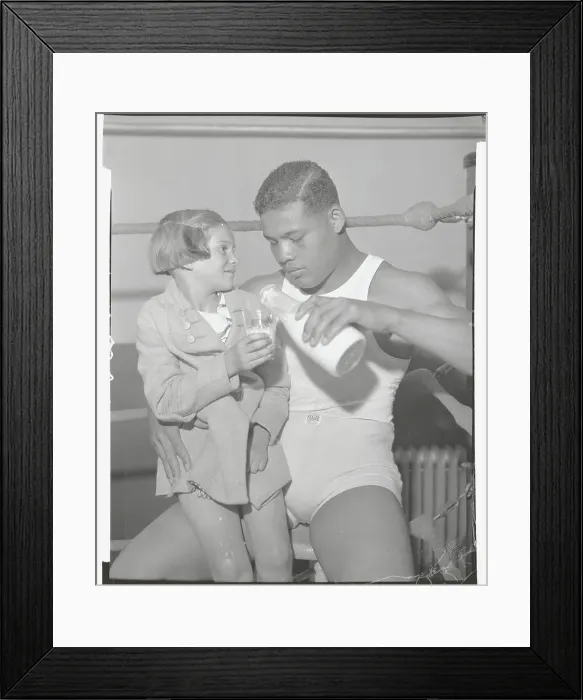 Framed Print : Joe Louis Pouring Milk for Girl Framed Print : Joe Louis Pouring Milk for Girl