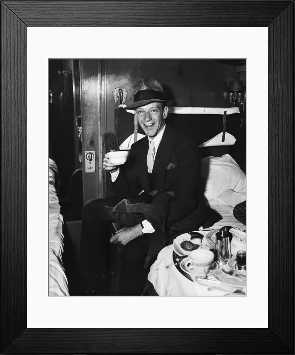 Framed Print : Fred Astaire Seated Sipping Coffee Framed Print : Fred Astaire Seated Sipping Coffee