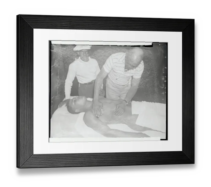 Framed Print : Jack Blackburn Examining Joe Louis Framed Print : Jack Blackburn Examining Joe Louis