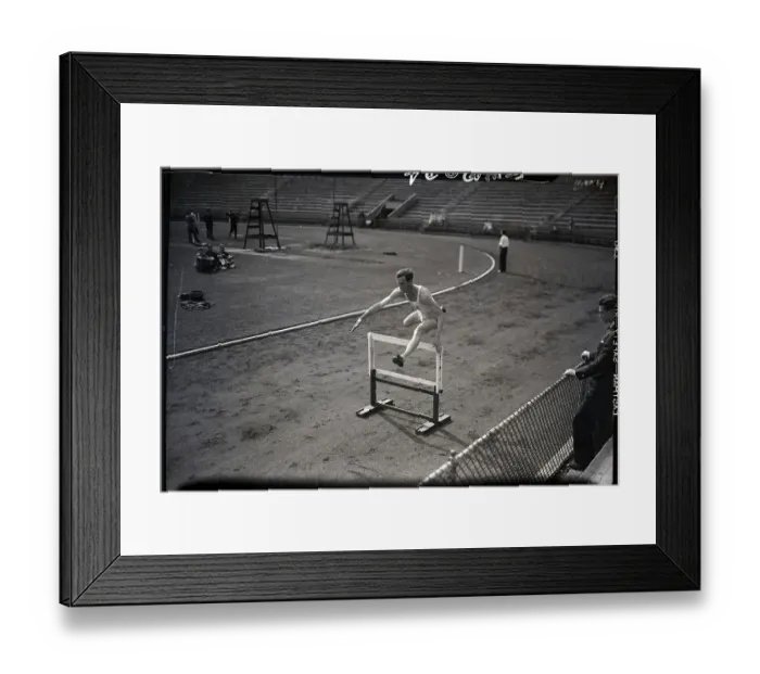 Framed Print : Percy Beard Jumping Over Hurdle