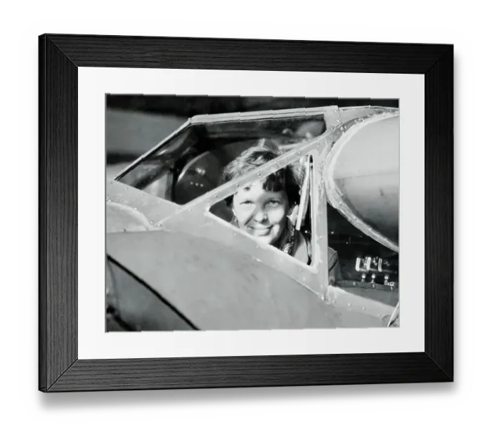 Framed Print : Amelia Earhart Peering out from Airplane