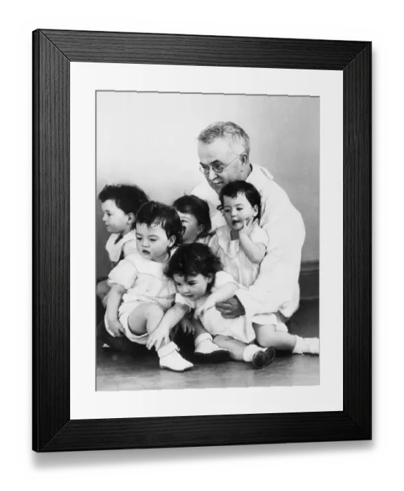 Framed Print : Dr. Allan Dafoe with the Dionne Quintuplets Framed Print : Dr. Allan Dafoe with the Dionne Quintuplets