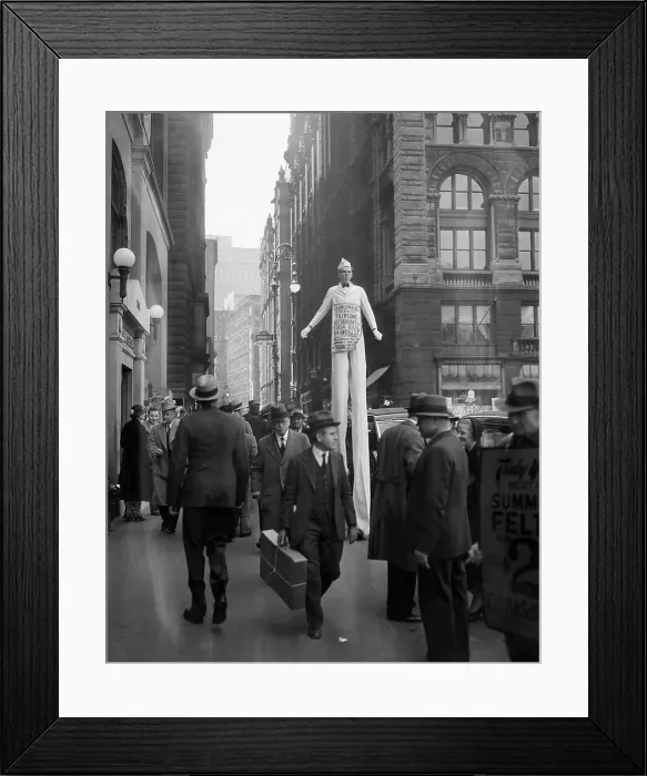 Framed Print : Sandwich Man on Stilts Framed Print : Sandwich Man on Stilts
