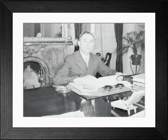 Framed Print : Dennis Chavez Seated at Desk Framed Print : Dennis Chavez Seated at Desk