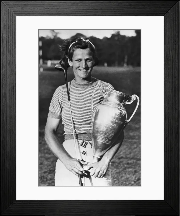 Framed Print : Babe Didrikson Holding Trophy and Golf Club Framed Print : Babe Didrikson Holding Trophy and Golf Club