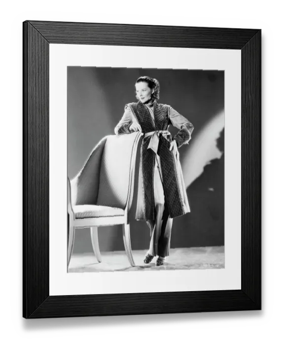 Framed Print : Katharine Hepburn Modelling Gold Robe Framed Print : Katharine Hepburn Modelling Gold Robe