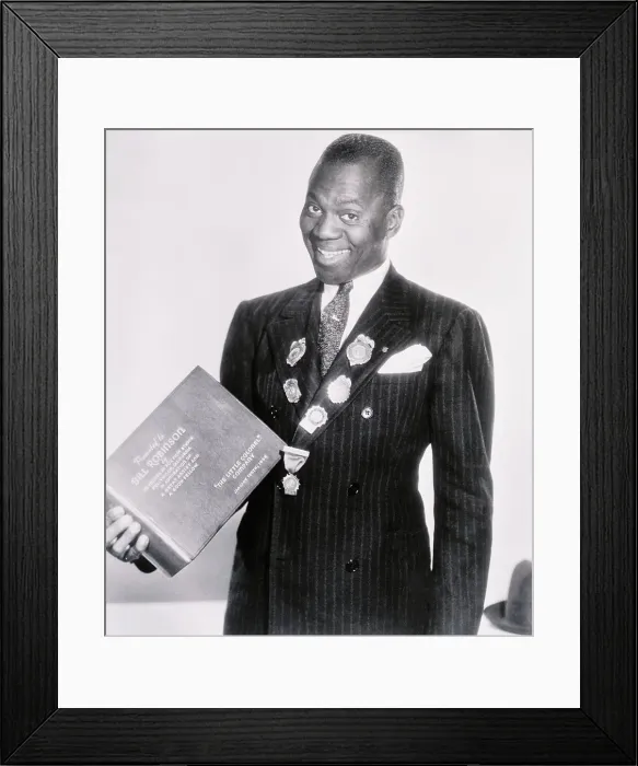Framed Print : Dancer Bill Robinson with His New Bound Movie Book Framed Print : Dancer Bill Robinson with His New Bound Movie Book