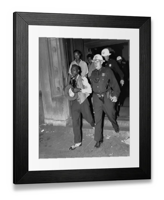 Framed Print : Police Officer Leading Injured Man Framed Print : Police Officer Leading Injured Man