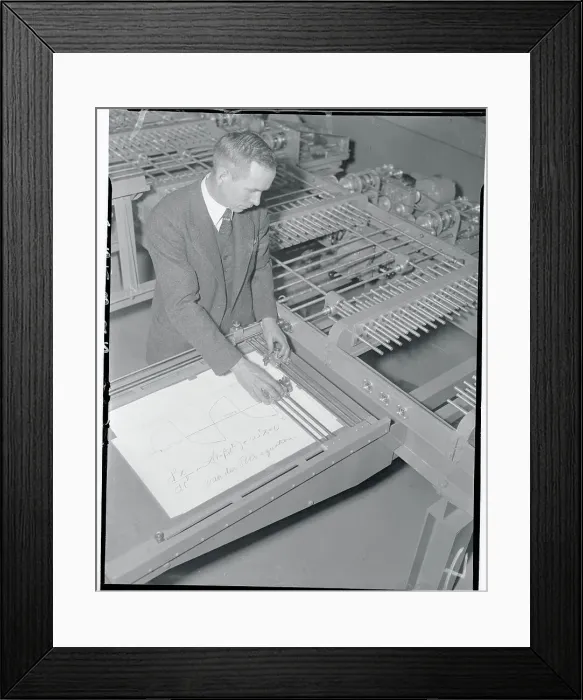 Framed Print : Miles Nelson Operating a Calculator Framed Print : Miles Nelson Operating a Calculator