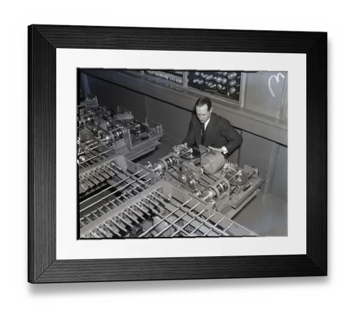 Framed Print : Man Operates Computer Controls Framed Print : Man Operates Computer Controls