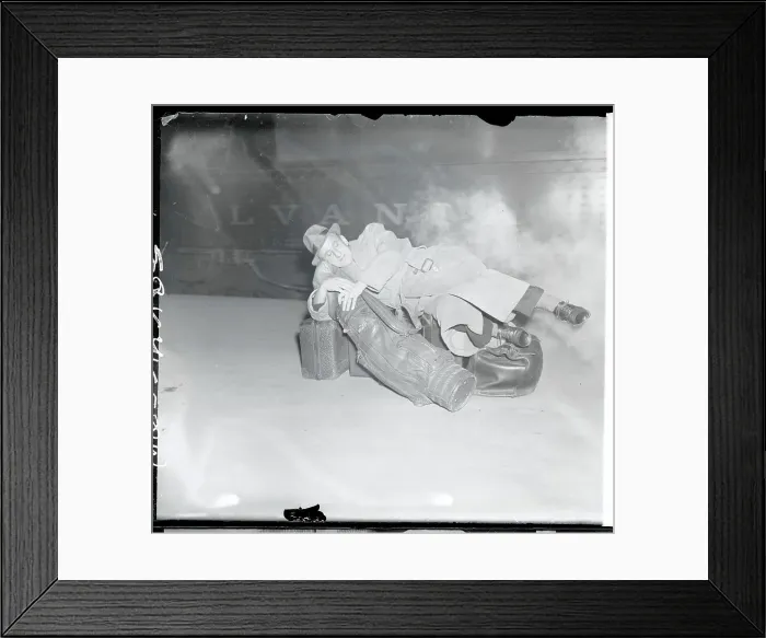 Framed Print : Traveler Sleeping on Luggage Framed Print : Traveler Sleeping on Luggage