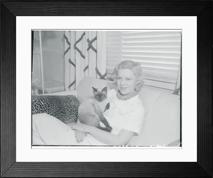 Framed Print : Glenda Farrell Holding Cat While Sitting on Couch Framed Print : Glenda Farrell Holding Cat While Sitting on Couch