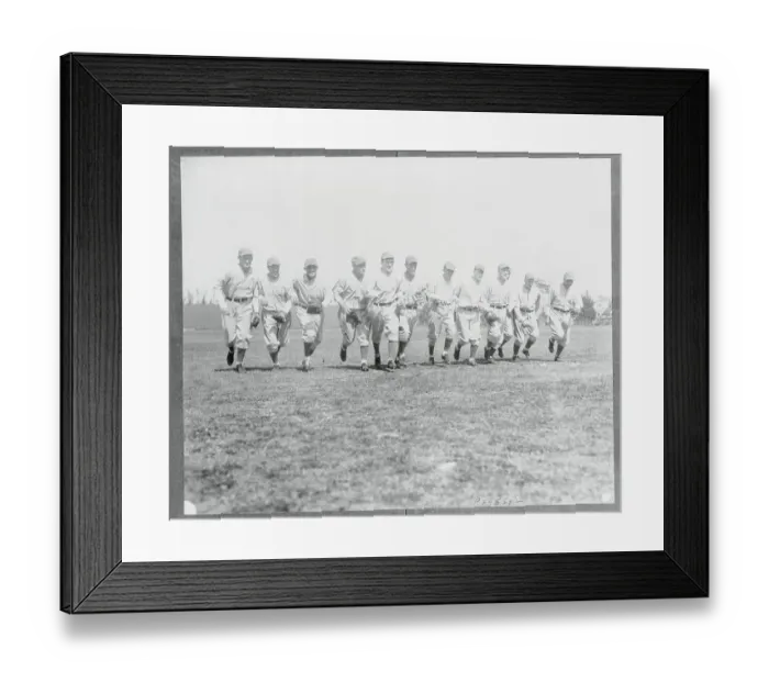 Framed Print : Athletic Teammates Exercising on the Field Framed Print : Athletic Teammates Exercising on the Field