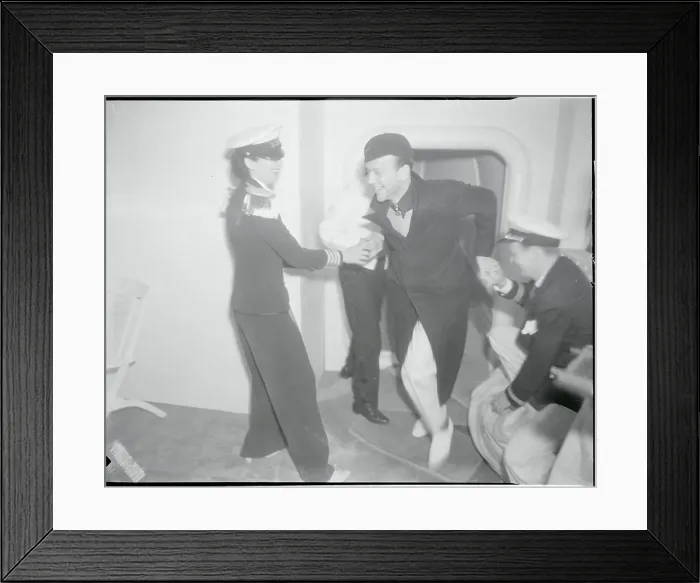 Framed Print : Kay Francis Helping Fred Astaire